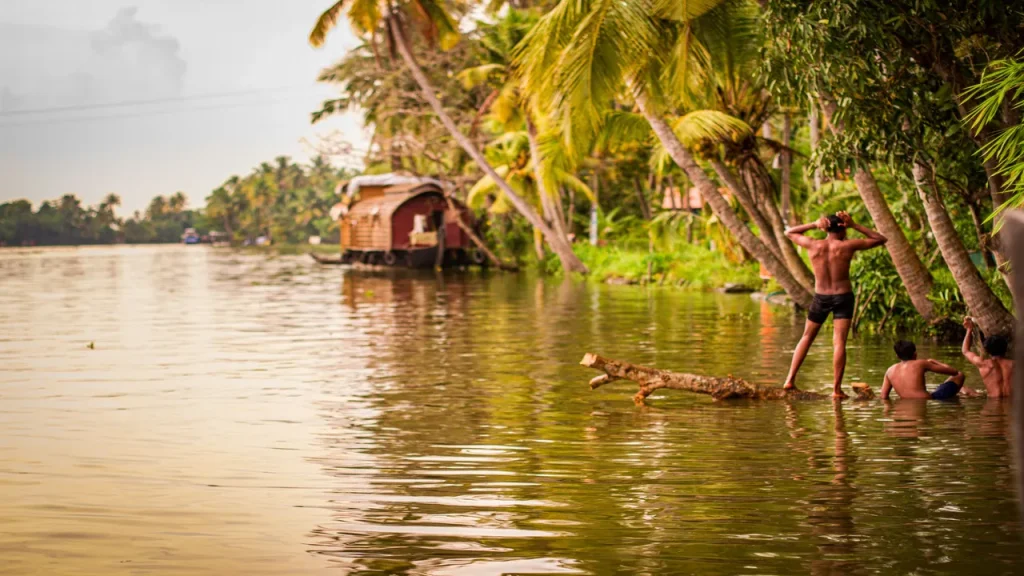 Houseboat and Natives